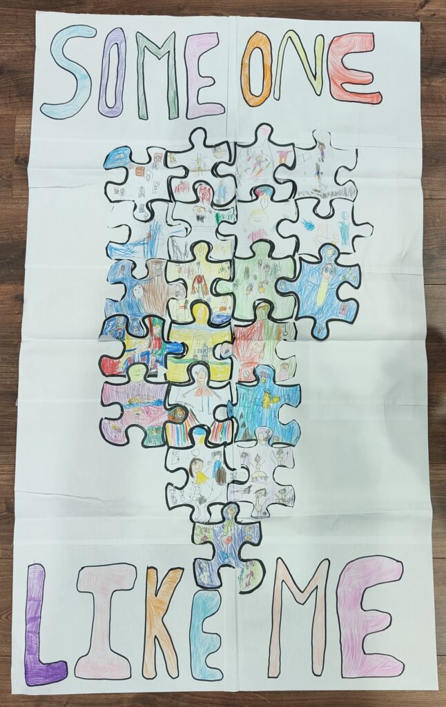 A piece of paper with collage of puzzle pieces displaying child's drawings on them